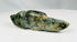 Hand-carved greenstone effigy amulet from Pre-Columbian Mesoamerica