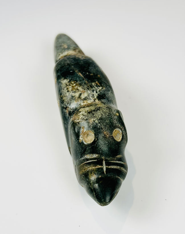Pre-Columbian carved stone pendant with drilled hole and compact sculptural form