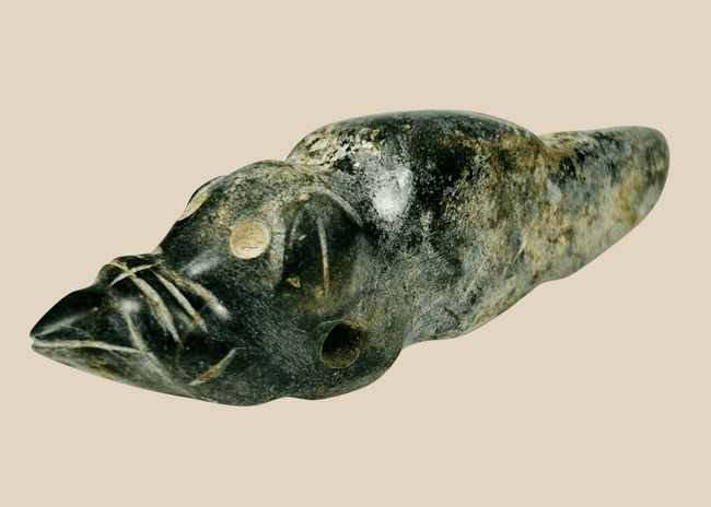 Pre-Columbian greenstone animal effigy pendant with drilled suspension hole