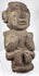 Dark volcanic stone figure from Guerrero tradition with strong geometric facial features