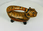 Ancient Guanacaste-Nicoya feline vessel with painted spotted motif and polished red slip finish