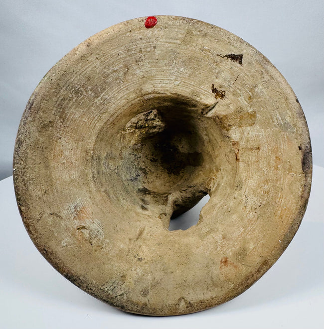 Ancient Manteño ceremonial pottery from coastal Ecuador featuring a sculpted human figure and ritual incense chamber.