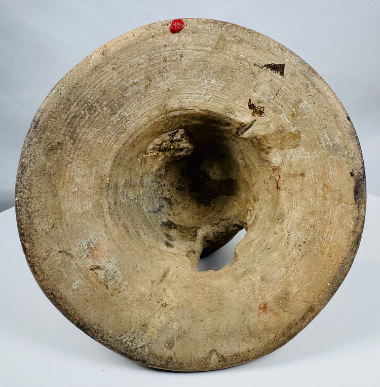 Ancient Manteño ceremonial pottery from coastal Ecuador featuring a sculpted human figure and ritual incense chamber.