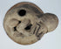 Pre-Columbian Ecuadorian incensario featuring a crouching anthropomorphic figure, vented chamber, and mineral encrustation.