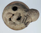 Pre-Columbian Ecuadorian incensario featuring a crouching anthropomorphic figure, vented chamber, and mineral encrustation.