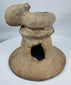 Pre-Columbian terracotta incensario from Ecuador with expressive anthropomorphic sculpture and weathered archaeological surface.