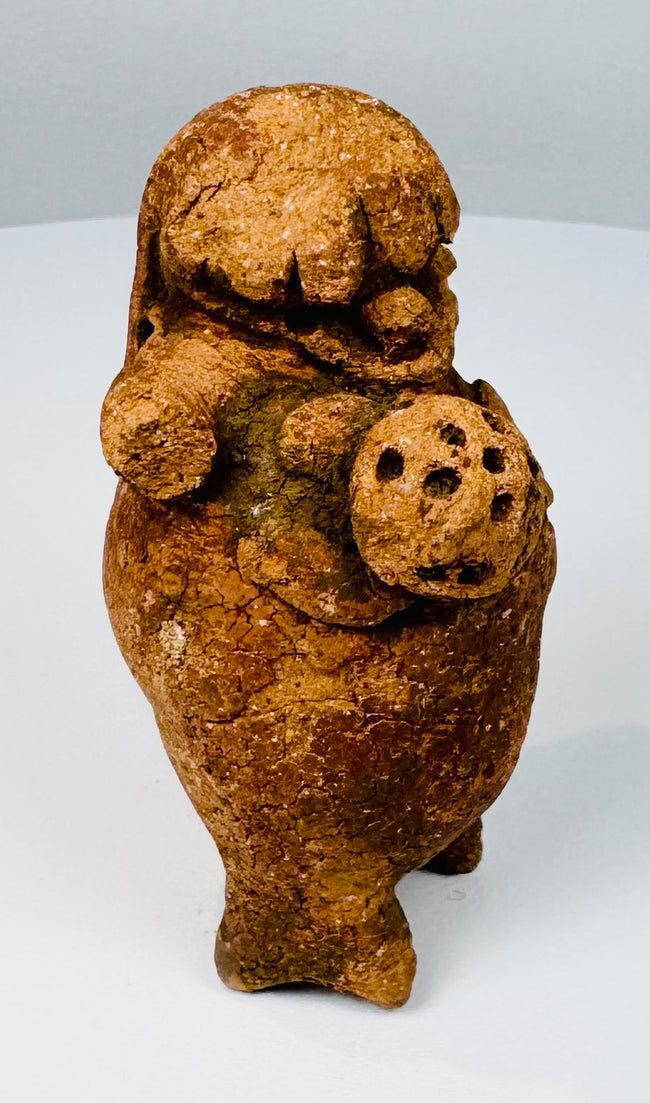 Maya Late Classic ceramic rattle with short standing legs, applied arms, and mineral deposits