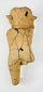 Ancient Mesoamerican figurative ceramic artifact photographed against a neutral background