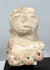 Ancient Mesoamerican terracotta female effigy fragment displaying a large ceremonial headdress and closed eyes.