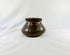 Pre-Columbian Mesoamerican pottery vessel showing painted polychrome patterns and rounded body shape.
