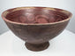 Pre-Columbian Colombian ceramic bowl with bichrome slip, concentric interior patterns, and stylized animal imagery.