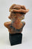 Back of ancient terracotta seated figure with original mineral patina.