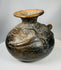 Ancient Costa Rica pottery vessel with reptile imagery and aged surface