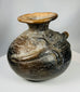 Ancient Costa Rica pottery vessel with reptile imagery and aged surface