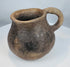 Ancient Paquimé earthenware vessel dating to circa 1100–1450 CE with naturally aged surface and archaeological patina.