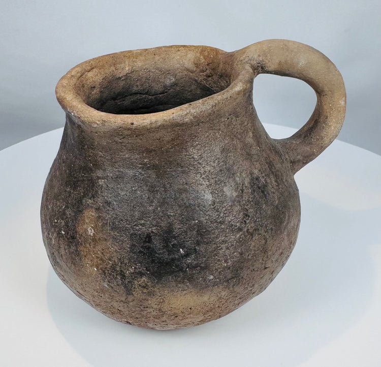Ancient Paquimé earthenware vessel dating to circa 1100–1450 CE with naturally aged surface and archaeological patina.