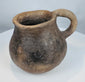 Ancient Paquimé earthenware vessel dating to circa 1100–1450 CE with naturally aged surface and archaeological patina.