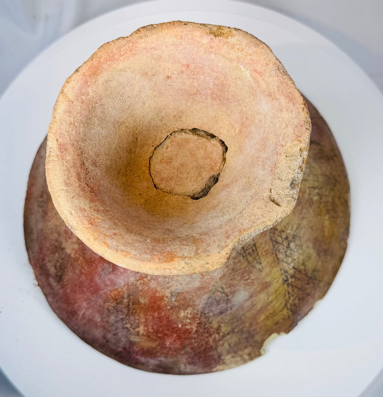 Pre-Columbian ceremonial serving bowl with broad flared form and geometric painted interior decoration.