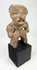 Ancient West Mexico anthropomorphic terracotta figure with stylized head and pierced ears