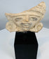 Ancient Veracruz-style terracotta figure fragment mounted on a custom display stand.