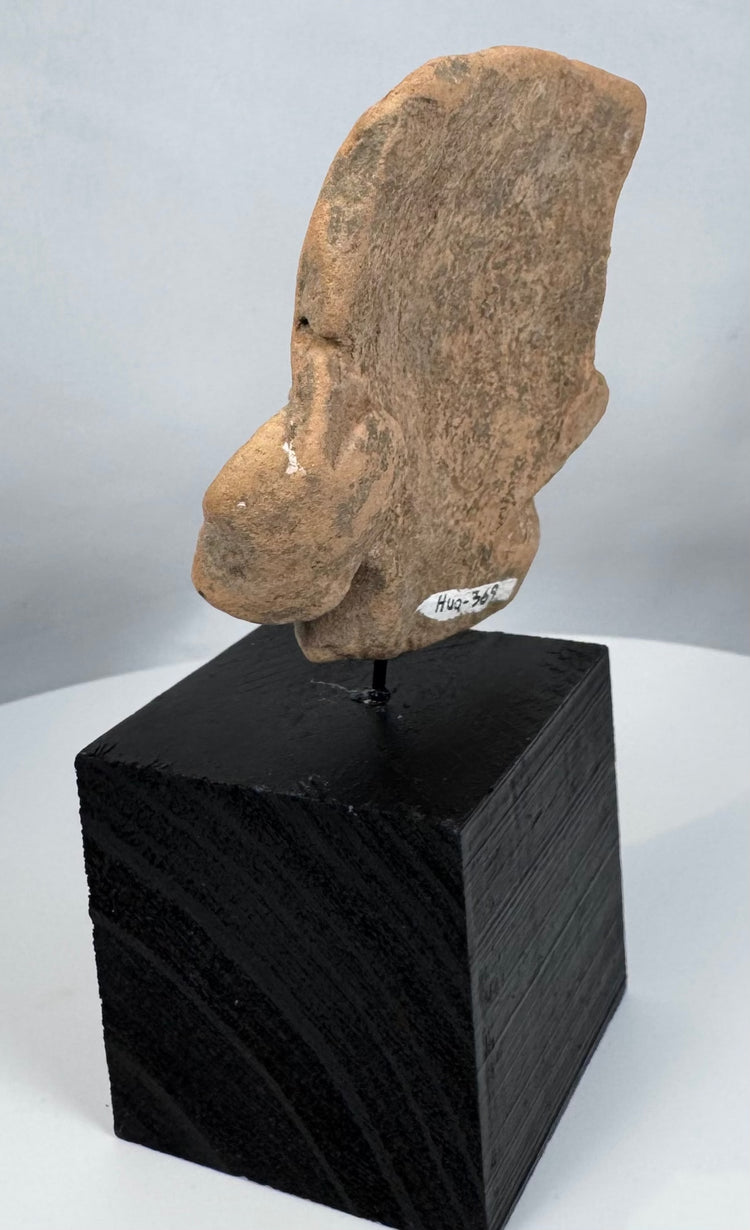 Ancient West Mexico terracotta portrait fragment representing ceremonial and funerary traditions.