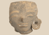 Pre-Columbian West Mexican terracotta head fragment with large ear spool mounted on a custom display stand.