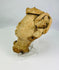 Historic Mesoamerican terracotta head artifact photographed for detailed examination