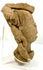 Side profile of ancient Mesoamerican terracotta head displaying headdress structure