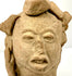 Pre-Columbian terracotta head artifact with elaborate headdress and expressive facial features