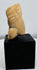 Pre-Columbian anthropomorphic terracotta head fragment exhibiting weathering consistent with long-term burial.