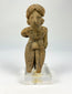 Pre-Columbian West Mexican terracotta standing figure with turban-style headdress, circa 300 BCE–500 CE, mounted on acrylic base