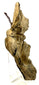 Weathered beige and grey dual-figure ceramic effigy displayed on clear acrylic stand