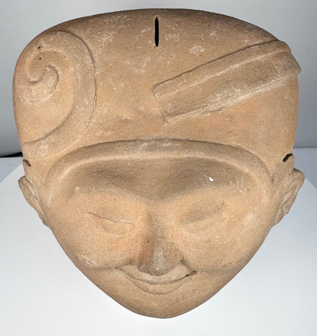 Classic Veracruz hollow ceramic Sonriente head with preserved headdress decoration and age-related patina