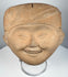 Classic Veracruz terracotta Sonriente head with broad smiling expression and elaborate ceremonial headdress