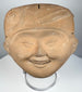 Classic Veracruz terracotta Sonriente head with broad smiling expression and elaborate ceremonial headdress