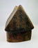 Side view of terracotta house model from West Mexico with ribbed roof texture.