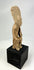 Terracotta standing figure with tall radiating headdress, abstract features, Nayarit or Jalisco