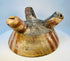 Pre-Columbian tripod bowl photographed from above showing interior design