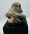 Pre-Columbian Mesoamerican terracotta effigy sculpture showing encrustation, age wear, and strong expression