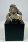 Authentic ancient Mesoamerican terracotta seated effigy with traces of pigment and archaeological patina