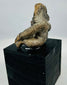 Anthropomorphic terracotta figure from ancient West Mexico with compact body form and ritual symbolism