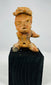 Pre-Columbian Nayarit or Jalisco terracotta burial figure with expressive features and traditional seated posture