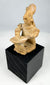 Pre-Columbian Nayarit or Jalisco terracotta shaft tomb musician figurine with cross-legged posture and ceremonial adornments