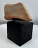 Ancient terracotta sculptural fragment representing a symbolic animal or spiritual being from the Pre-Columbian period.
