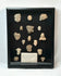 Pre-Columbian Mesoamerican terracotta fragments shadowbox with 16 votive heads, busts, and maskettes, 200 BCE–900 CE