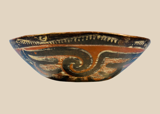 Pre-Columbian polychrome terracotta bowl with swirling geometric painted design