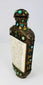 Qing Dynasty ritual flask used for Buddhist ceremonial purposes, featuring lion mask symbolism and stone-set bronze body