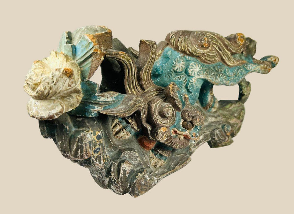Hand-carved wooden Qilin temple carving from Qing Dynasty China, circa 18th–19th century. Mythical guardian beast with flowing mane, painted details in turquoise, red, and gold, symbolizing prosperity, protection, and divine presence.