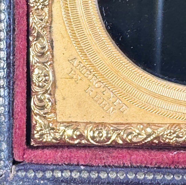 Nineteenth-century glass ambrotype portrait housed in a velvet-lined leatherette case