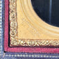 Nineteenth-century glass ambrotype portrait housed in a velvet-lined leatherette case
